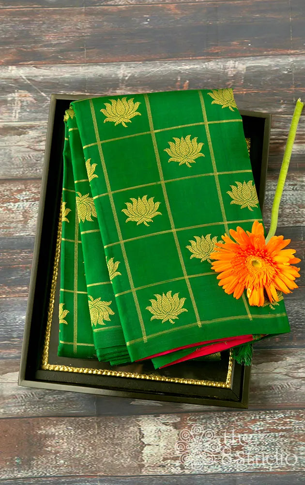 Green checked kanchipuram silk saree with lotus motifs