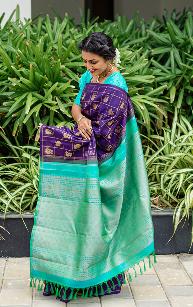 Aubergine colour kanchi pattu saree with checks and buttas