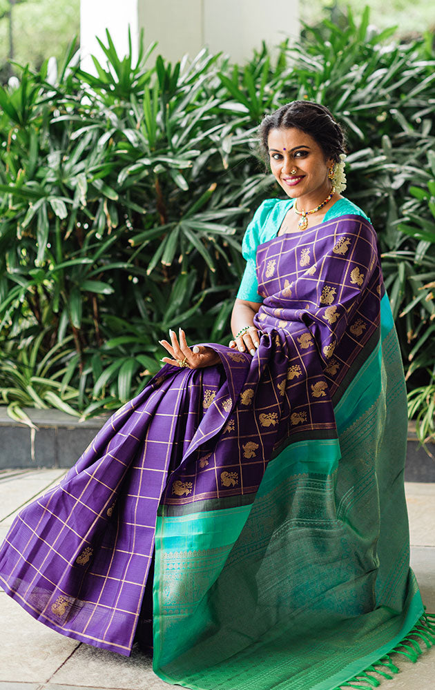 Aubergine colour kanchi pattu saree with checks and buttas