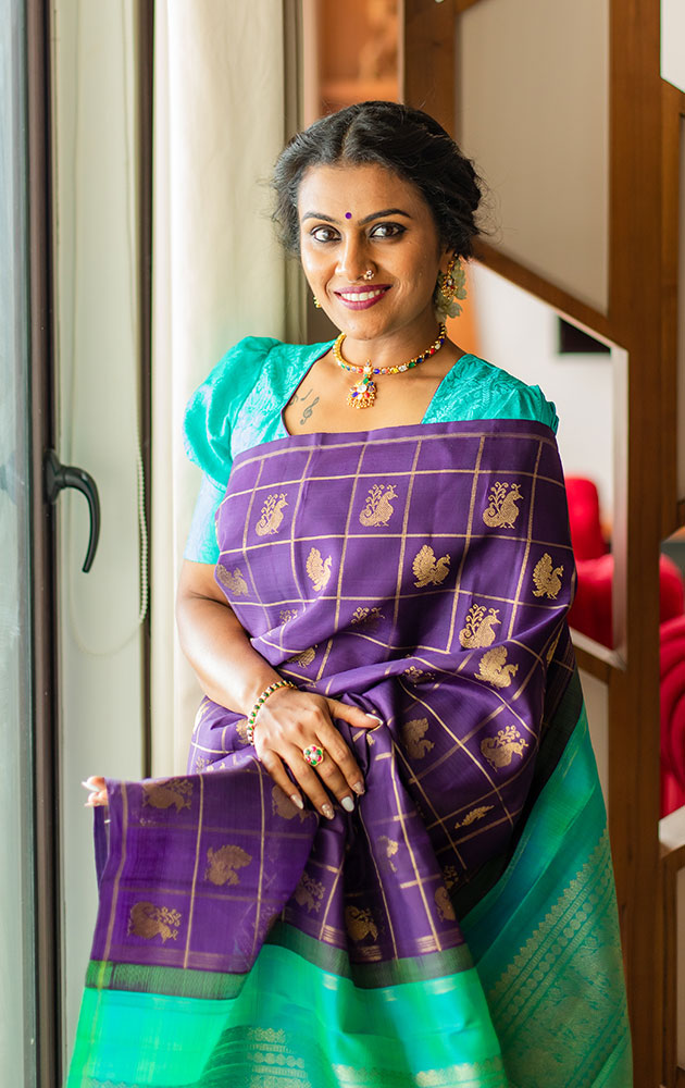 Aubergine colour kanchi pattu saree with checks and buttas