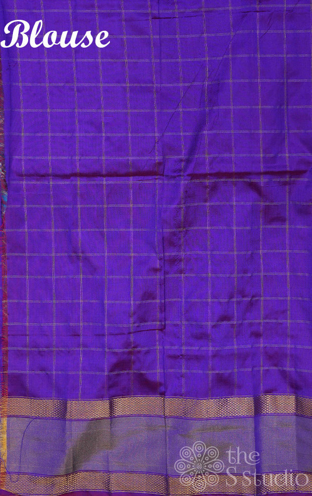 Light blue checked ikkat saree with elephant motif border