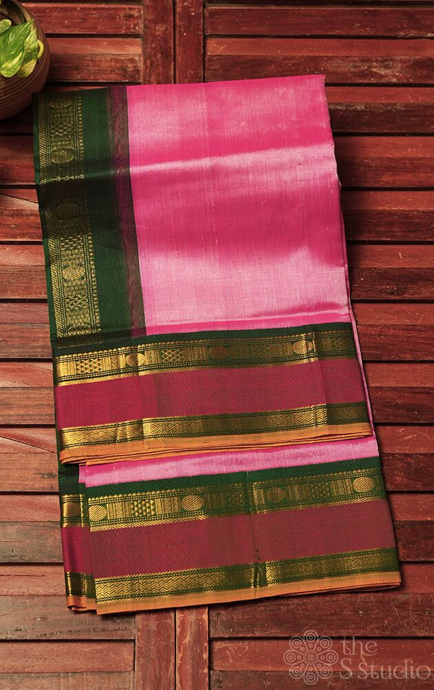 Onion pink plain silk cotton saree with green korvai border
