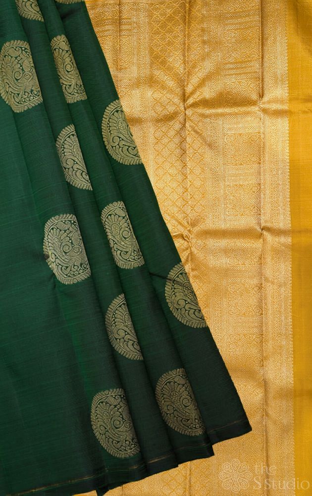 Bottle green kanjivaram silk saree with mustard pallu