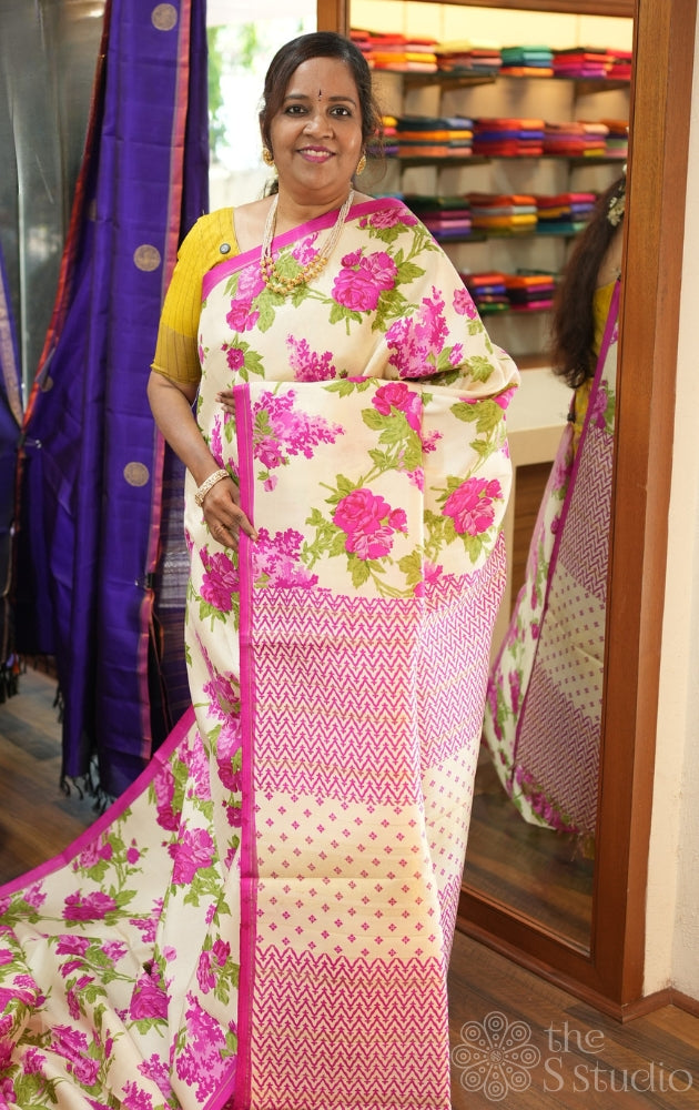 Cream kanchipuram silk saree with rani pink prints