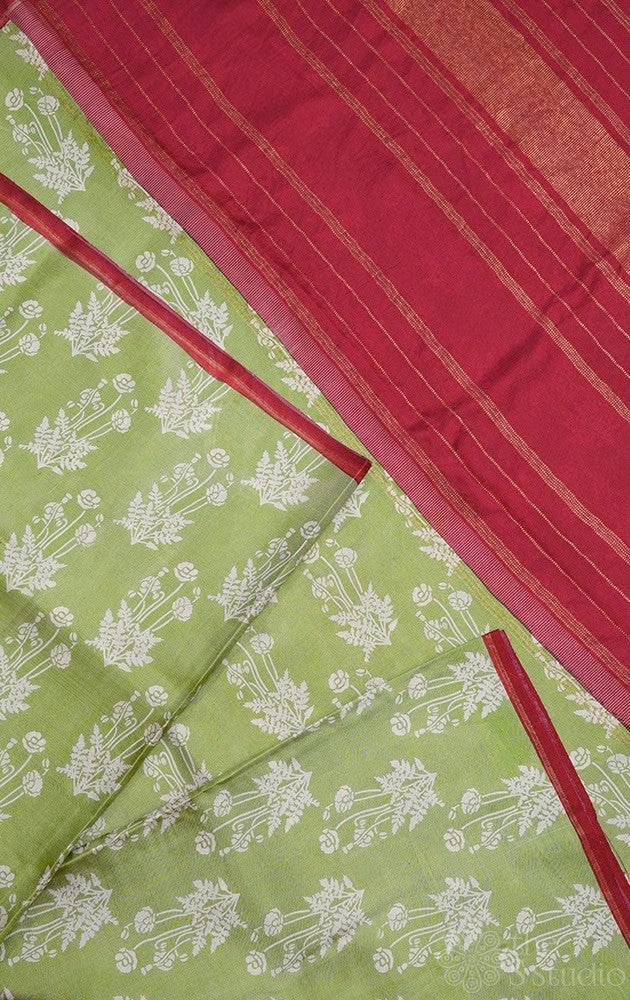Elachi green kanchipuram silk saree with prints and a maroon pallu