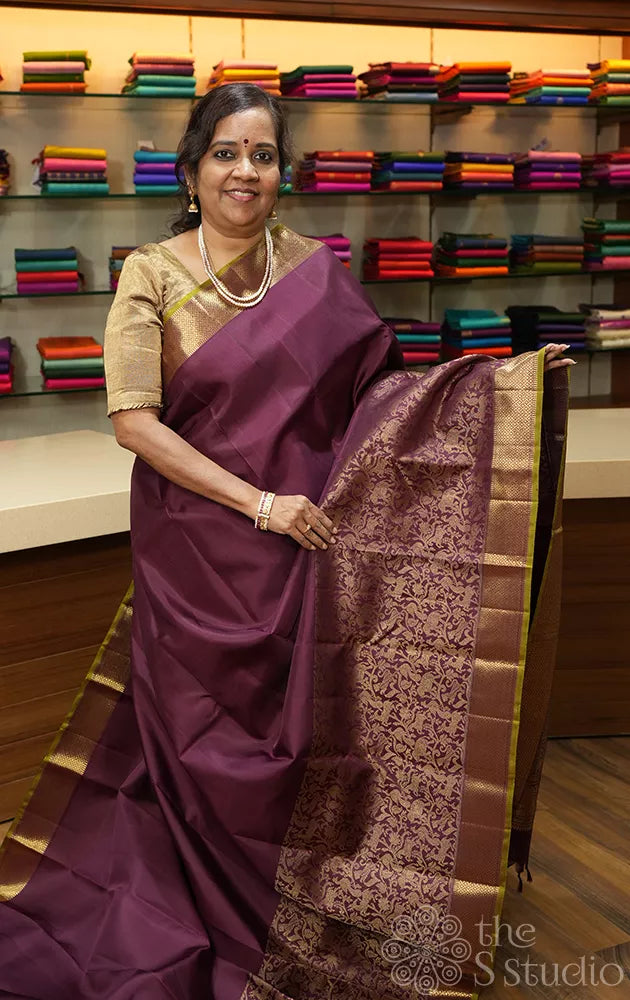 Brown kanjivaram silk saree with vanasinghram border