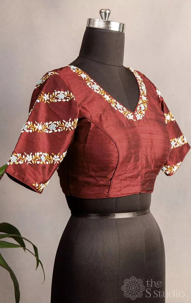 Maroon hand embroidered raw silk blouse with rounded v neck pattern