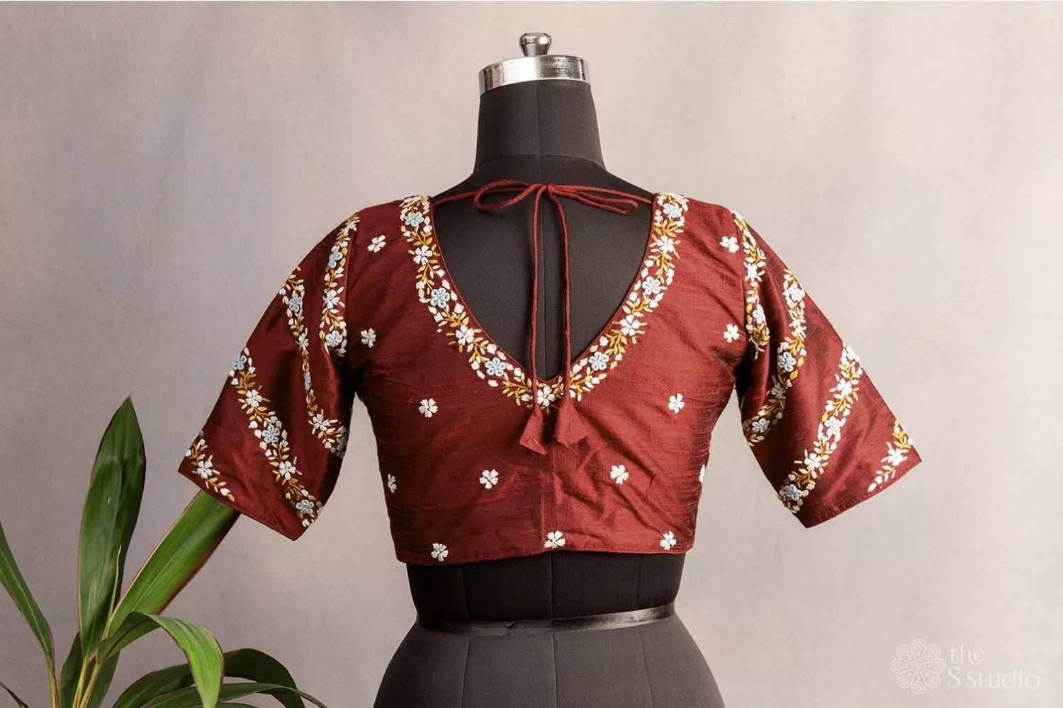 Maroon hand embroidered raw silk blouse with rounded v neck pattern