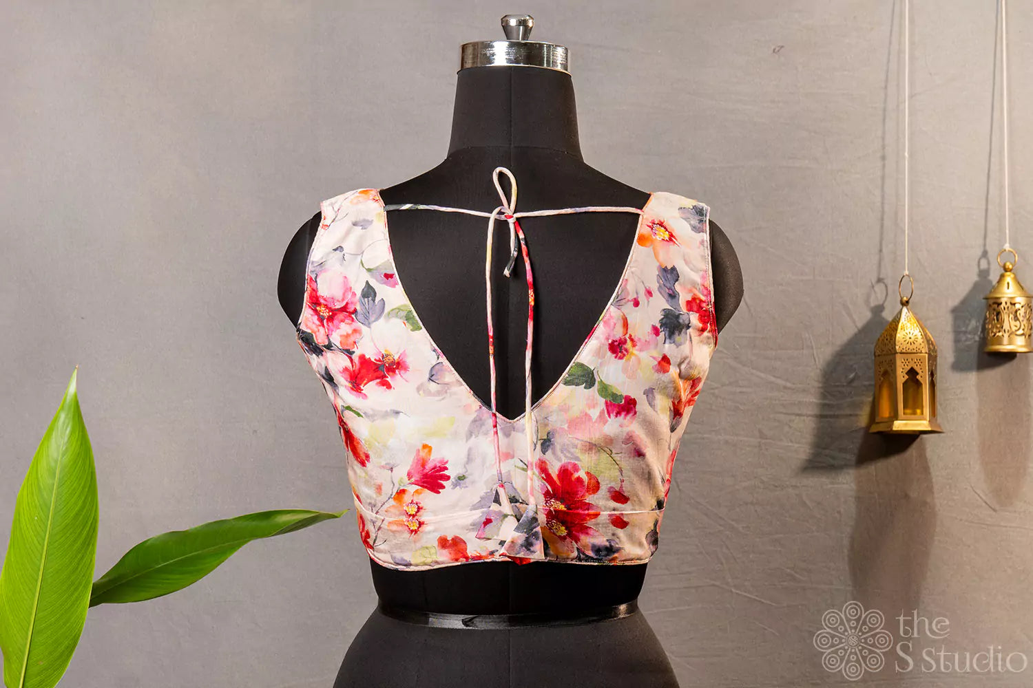 Light pink floral printed sleeveless semi silk readymade blouse