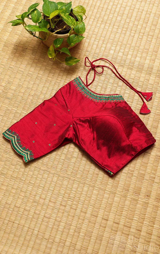 Red raw silk readymade blouse with aari work embroidery
