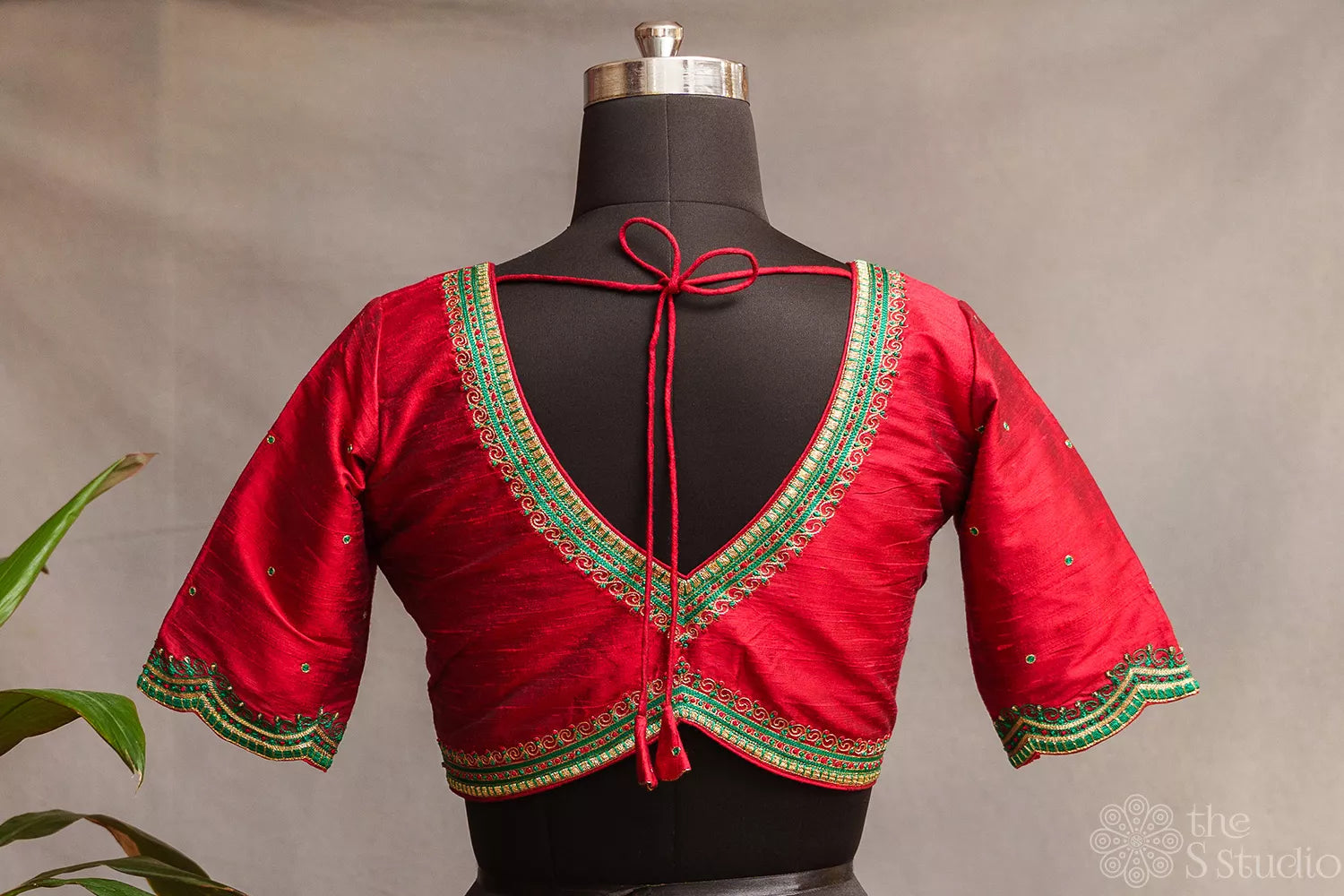 Red raw silk readymade blouse with aari work embroidery
