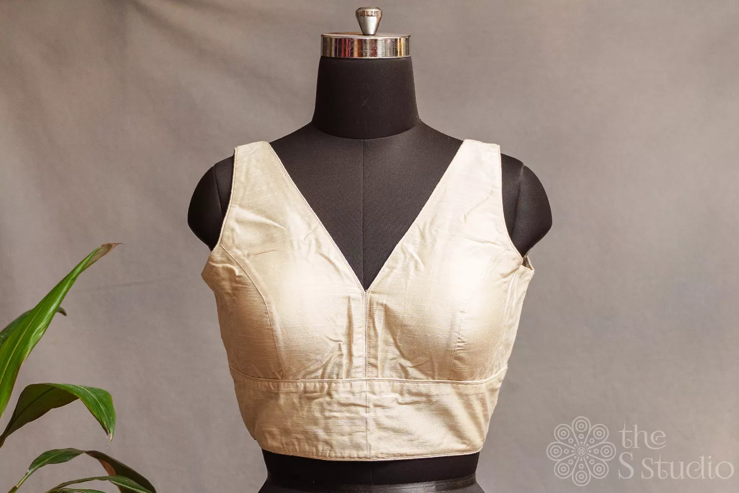 Off white cotton sleeveless readymade blouse