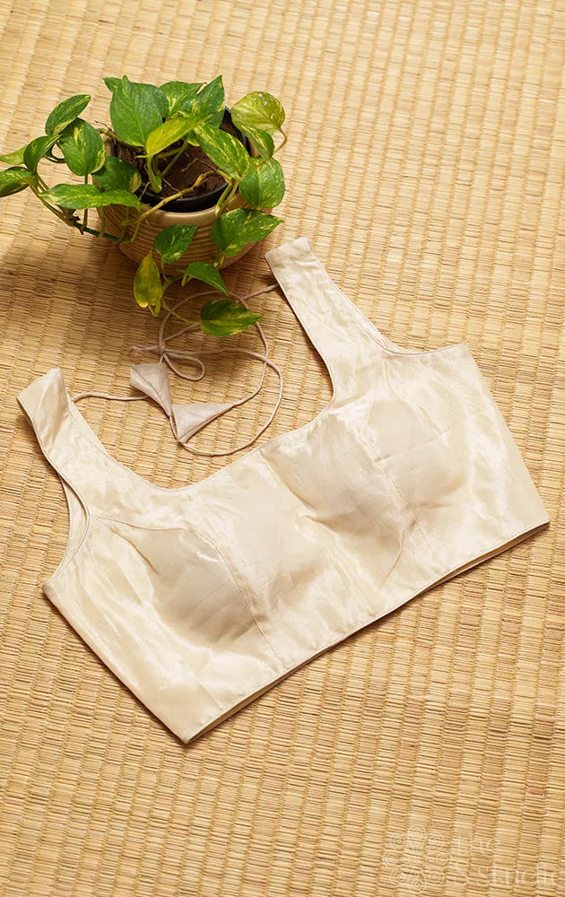 Off white tissue sleeveless readymade blouse