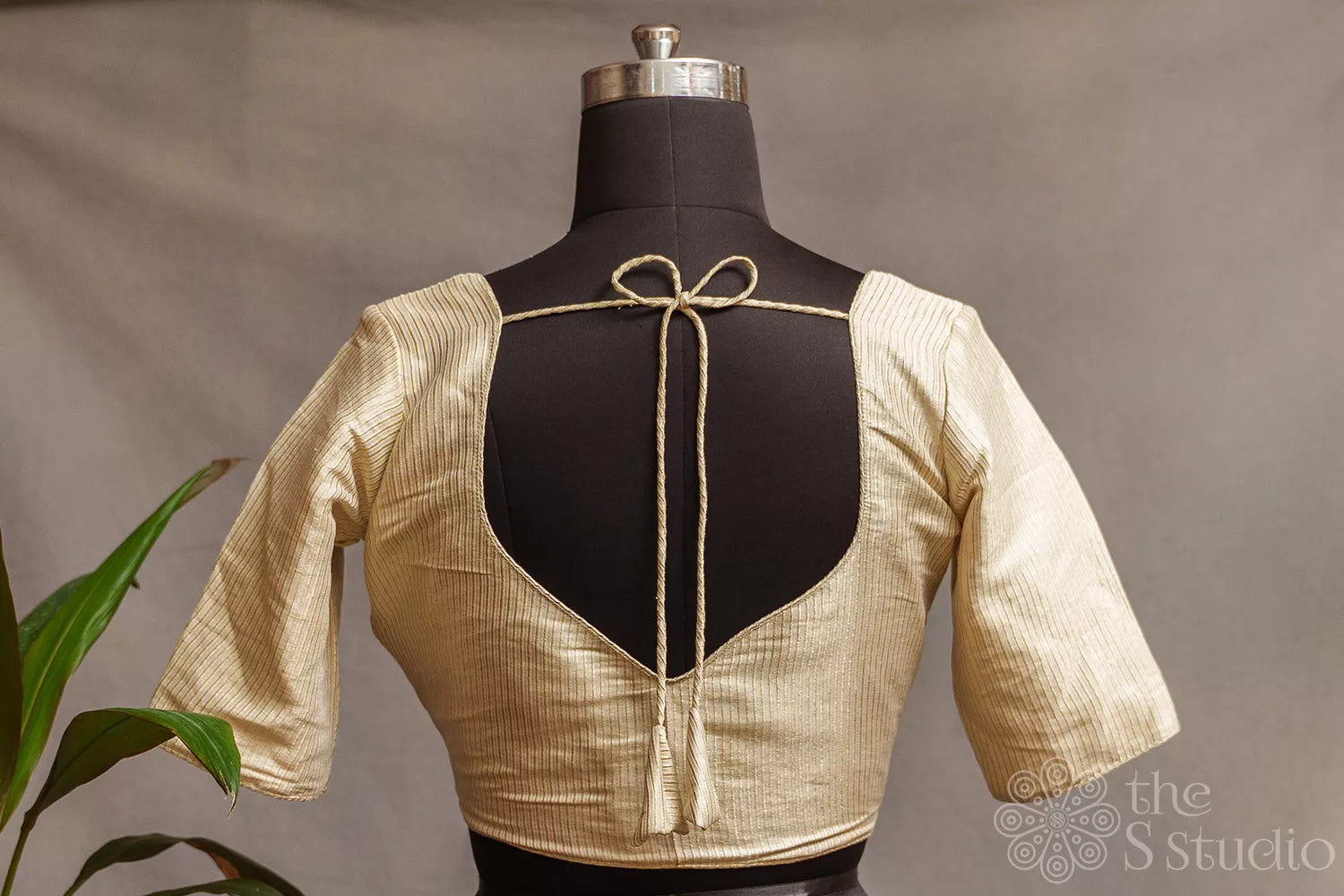 Off white tissue readymade blouse with zari stripes