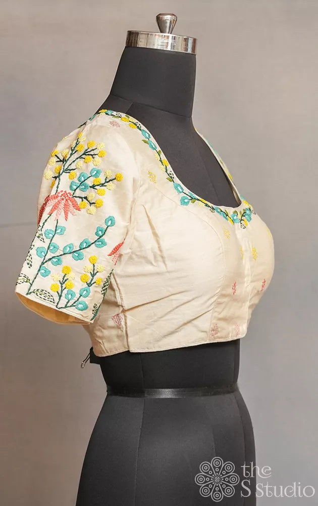 Off white readymade blouse with floral embroidery