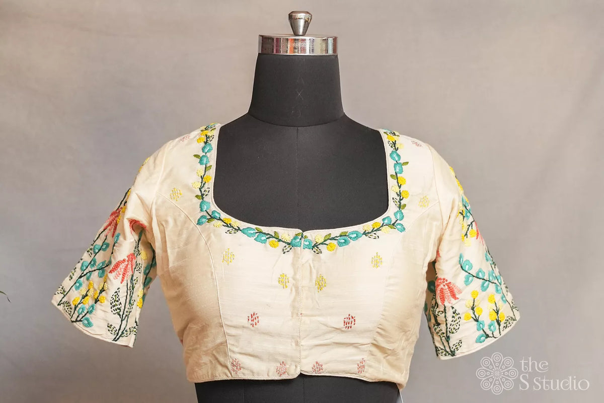 Off white readymade blouse with floral embroidery