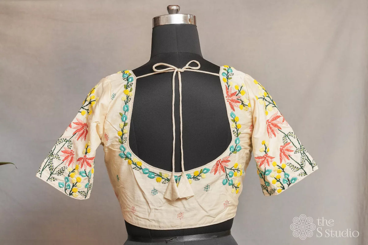 Off white readymade blouse with floral embroidery