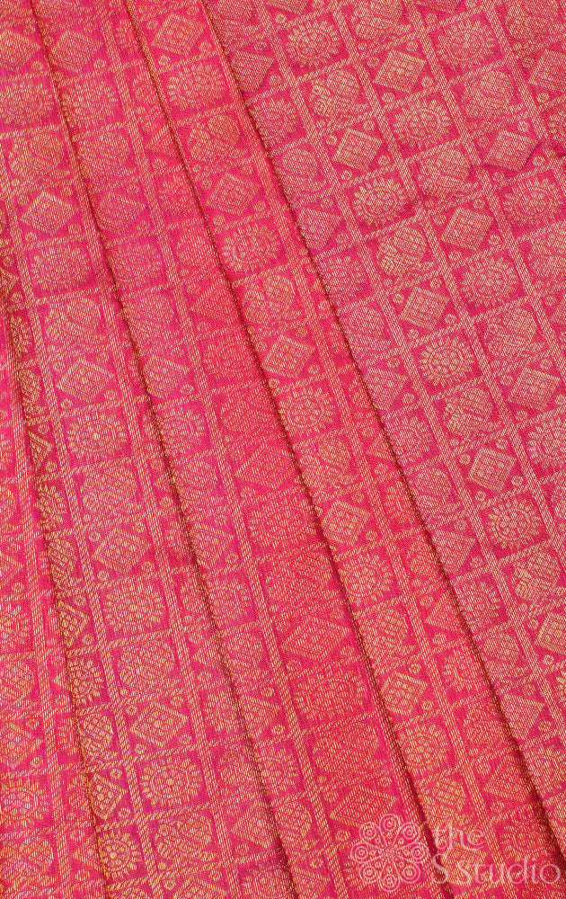 Rani pink kanchi silk blouse material with mayil chakram buttas