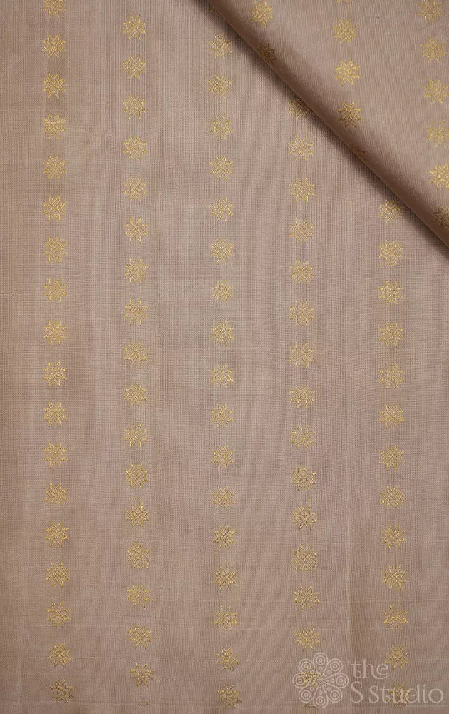 Beige kanchi silk blouse material with small zari kamalam buttas