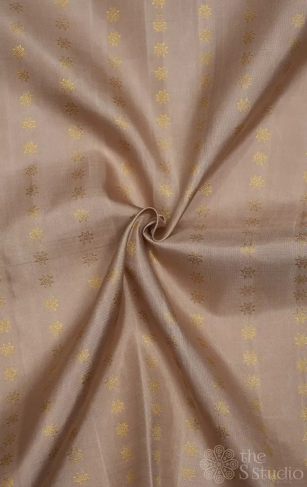 Beige kanchi silk blouse material with small zari kamalam buttas