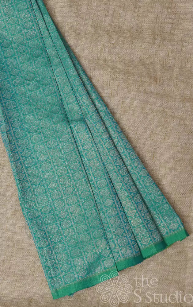 Sea blue kanchi silk blouse material with mayil chakaram motifs