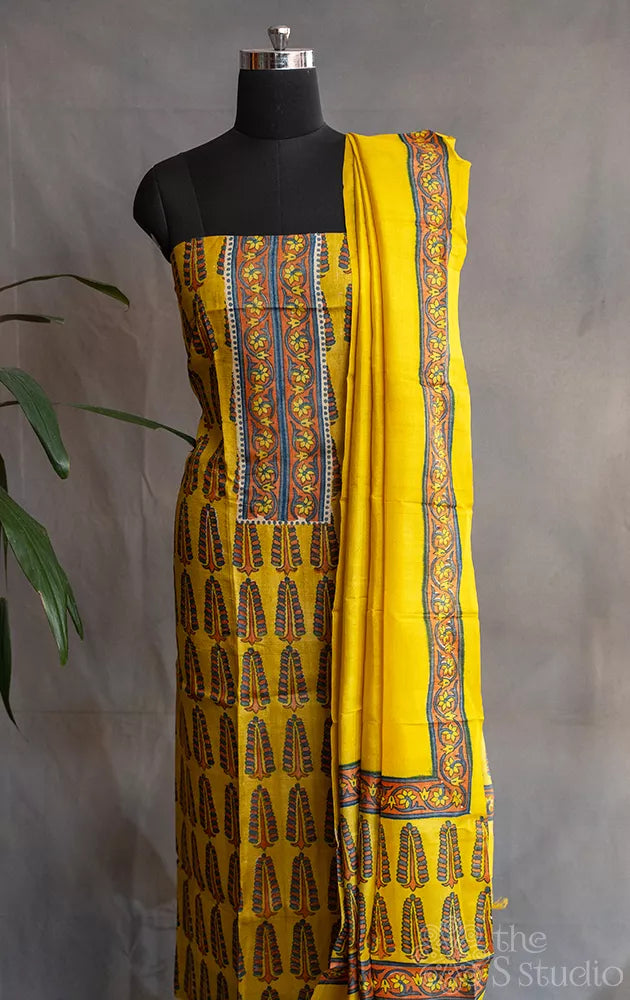 Yellow tussar silk salwar suit with grey block prints