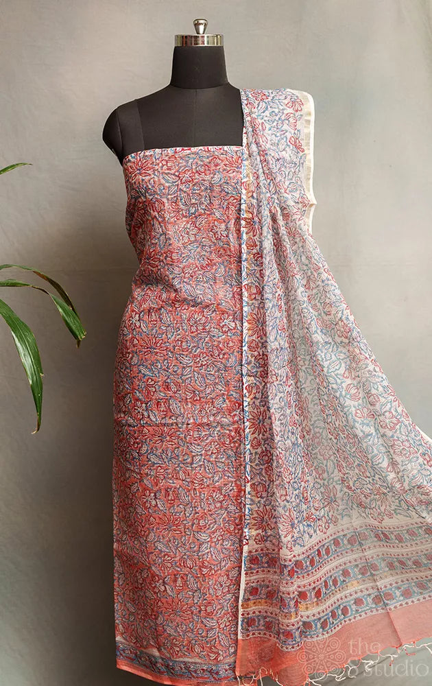 Peach kota cotton salwar suit with floral prints