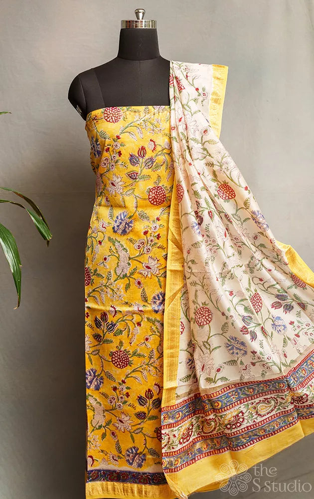 Yellow printed maheshwari silk cotton salwar set with white dupatta