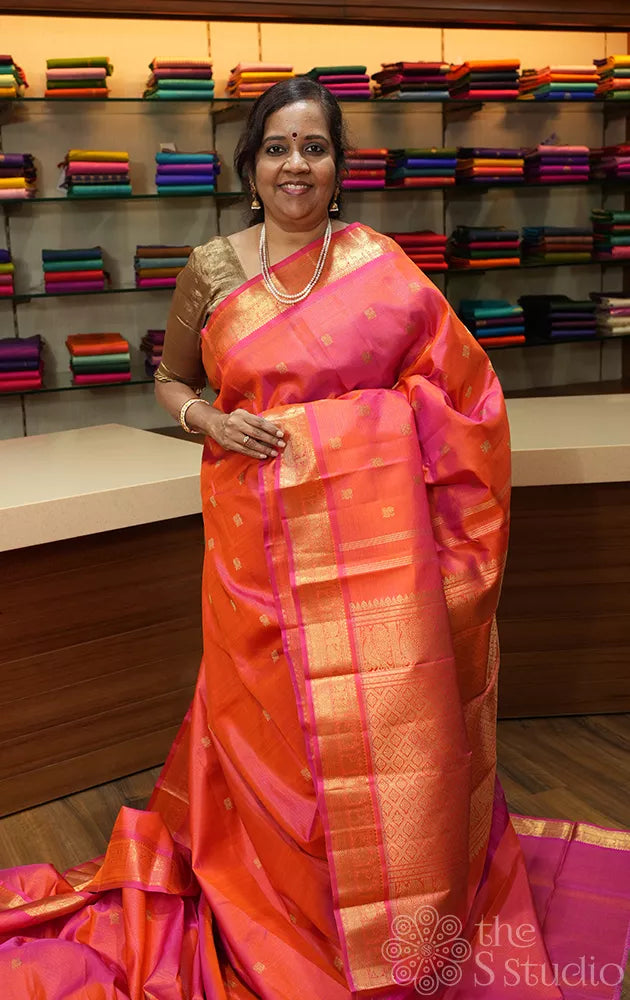 Bright peach vairaoosi kanjivaram saree with small border