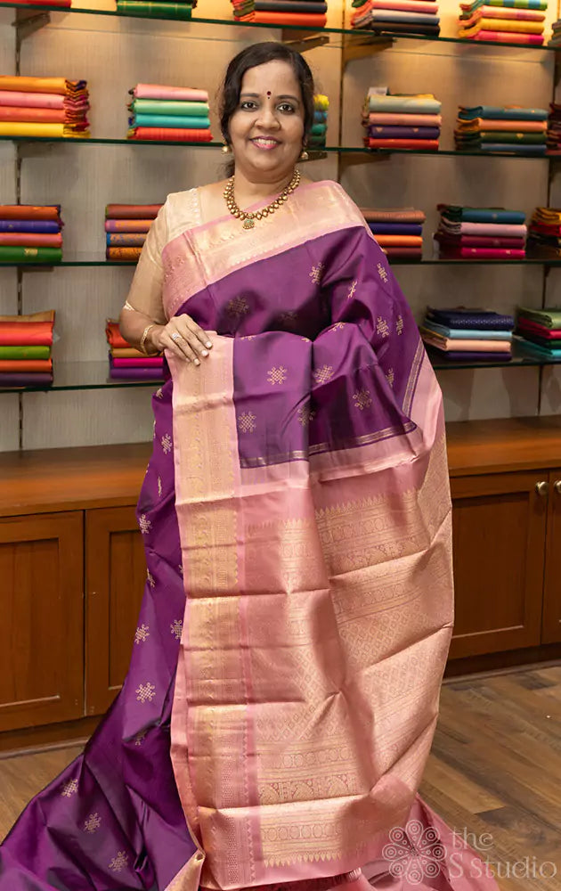 Deep purple colour kanchi silk saree with a korvai pink border