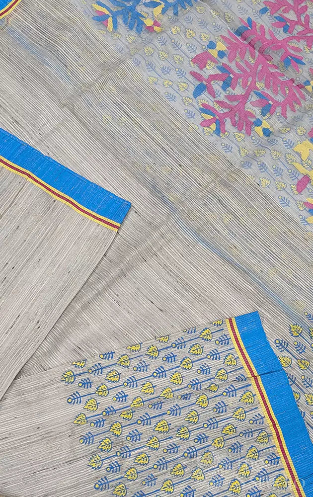 Beige semi tussar saree with blue border