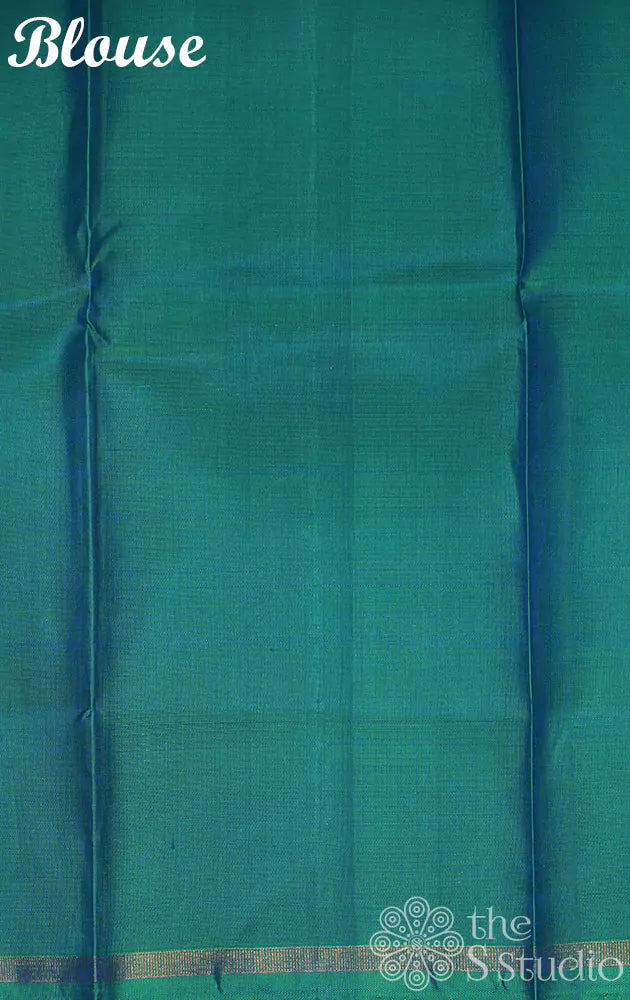 Lilac kanchi silk saree with floral prints and teal blue pallu