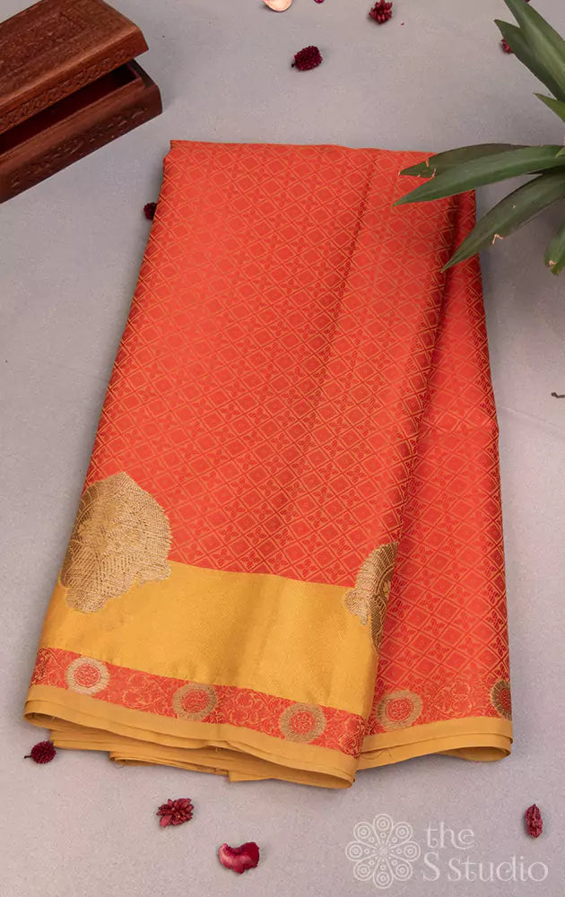 Rust semi kora silk saree with yellow border