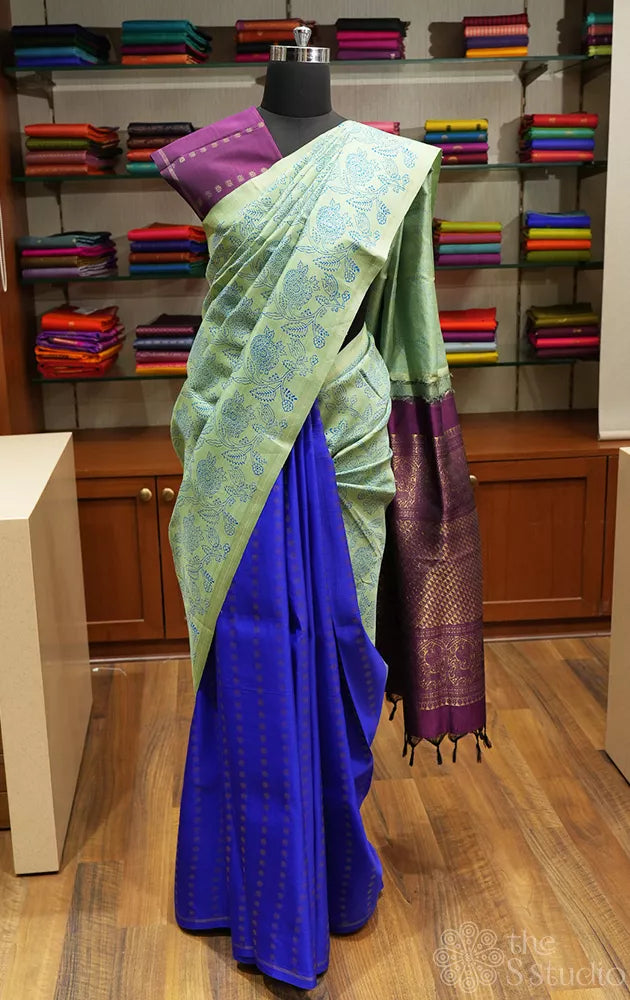 Elachi green and royal blue partly pallu kanchi silk saree with prints