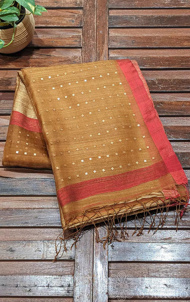 Golden brown matka silk saree adorned with sequin work pallu