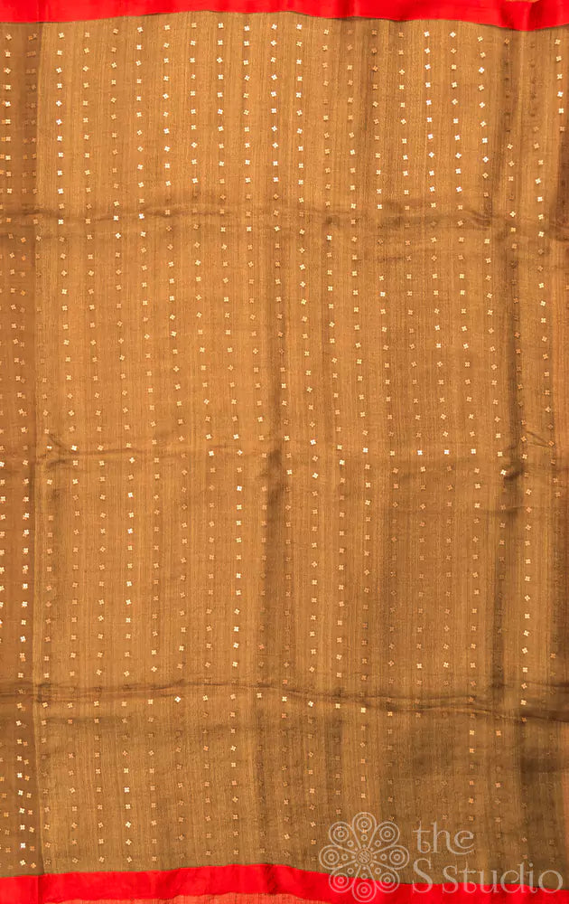 Golden brown matka silk saree adorned with sequin work pallu