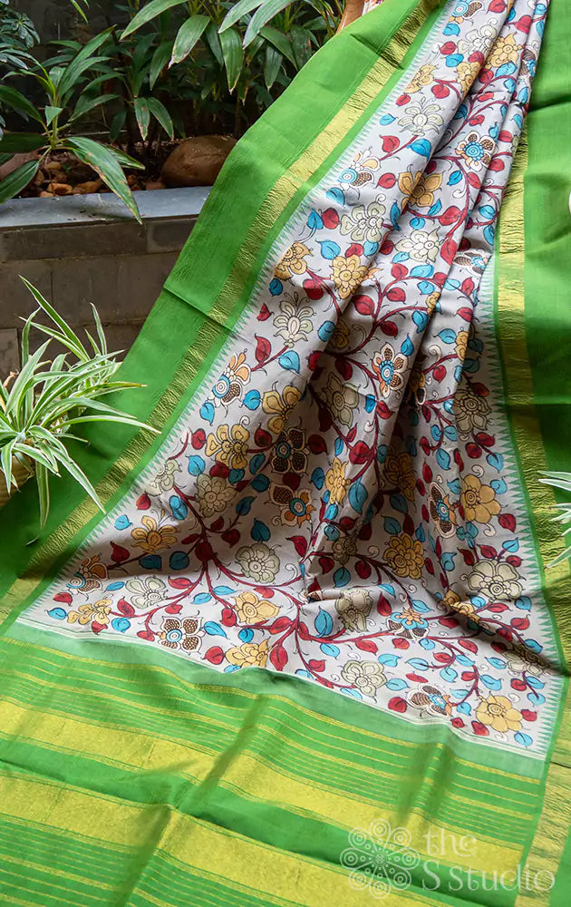 Grey pen kalamkari hand painted kanchipuram silk saree with parrot green border