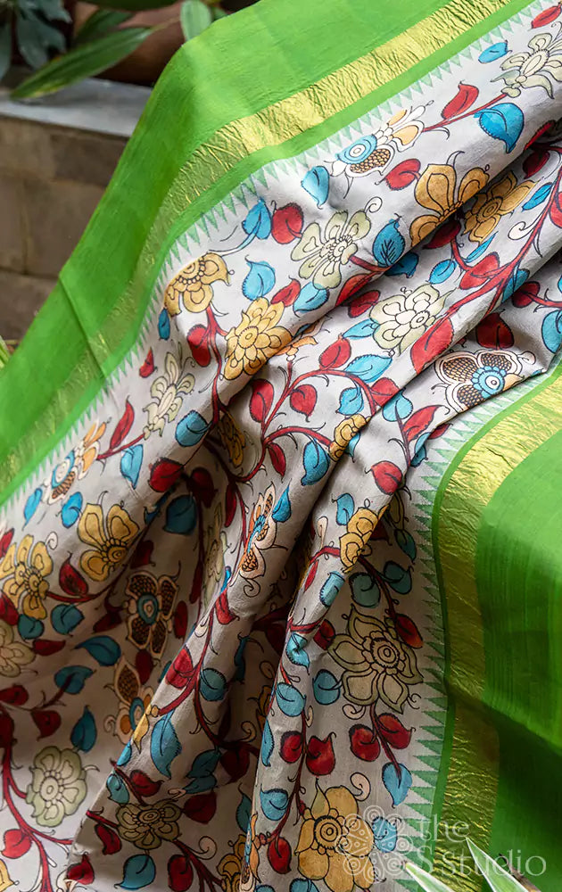 Grey pen kalamkari hand painted kanchipuram silk saree with parrot green border