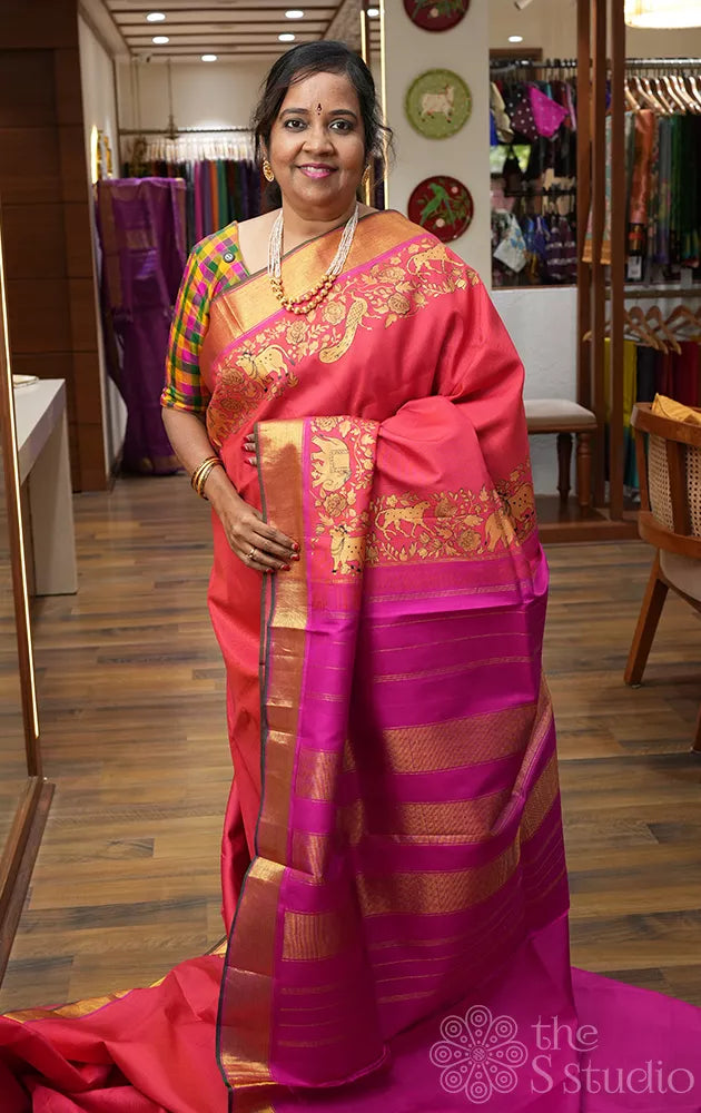 Peach kanchi silk saree with hand painting along the zari border