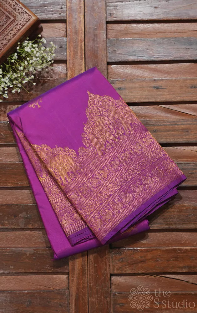 Purple kanchipuram silk saree with zari rich border