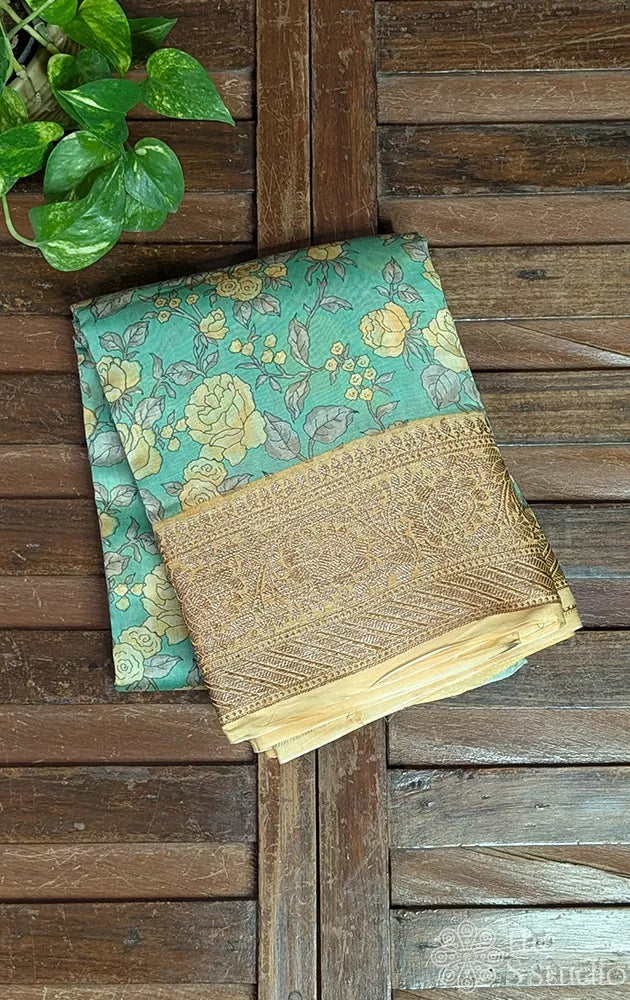 Pale green chanderi cotton saree with floral prints