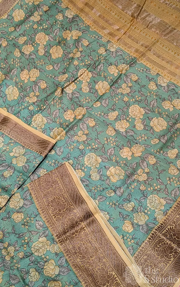 Pale green chanderi cotton saree with floral prints