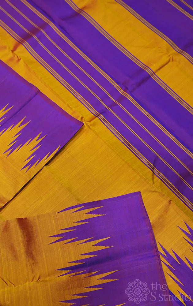 Mustard kanchipuram silk saree with purple temple border