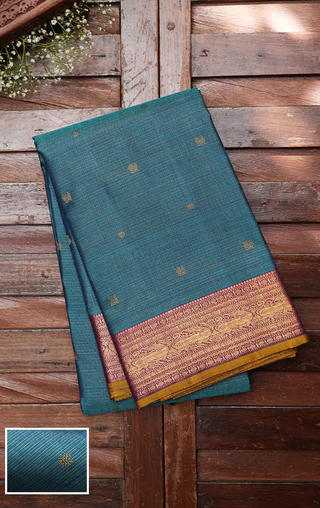 Rama blue vaira oosi kanchi silk saree with magenta pallu