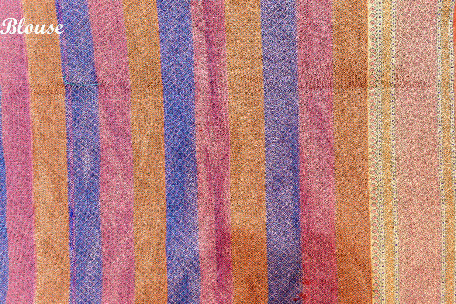 Navy blue bandhani saree with orange border and a brocade pallu