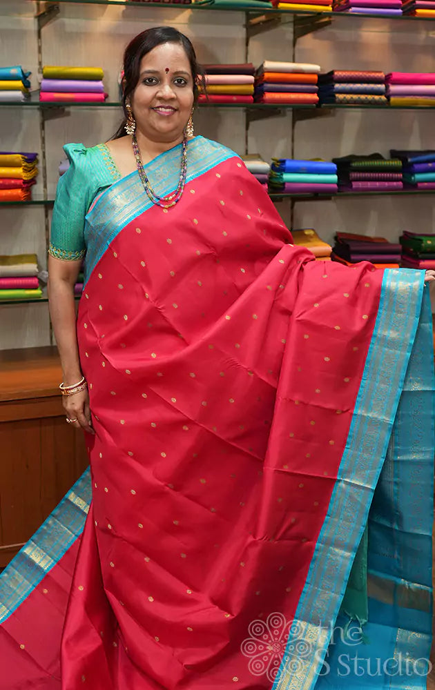 Red kanjivaram saree with korvai blue border