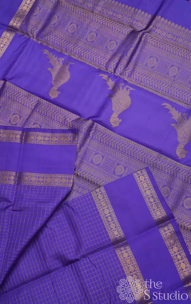 Dark lavendar kanchi silk saree with checks and parrot pallu