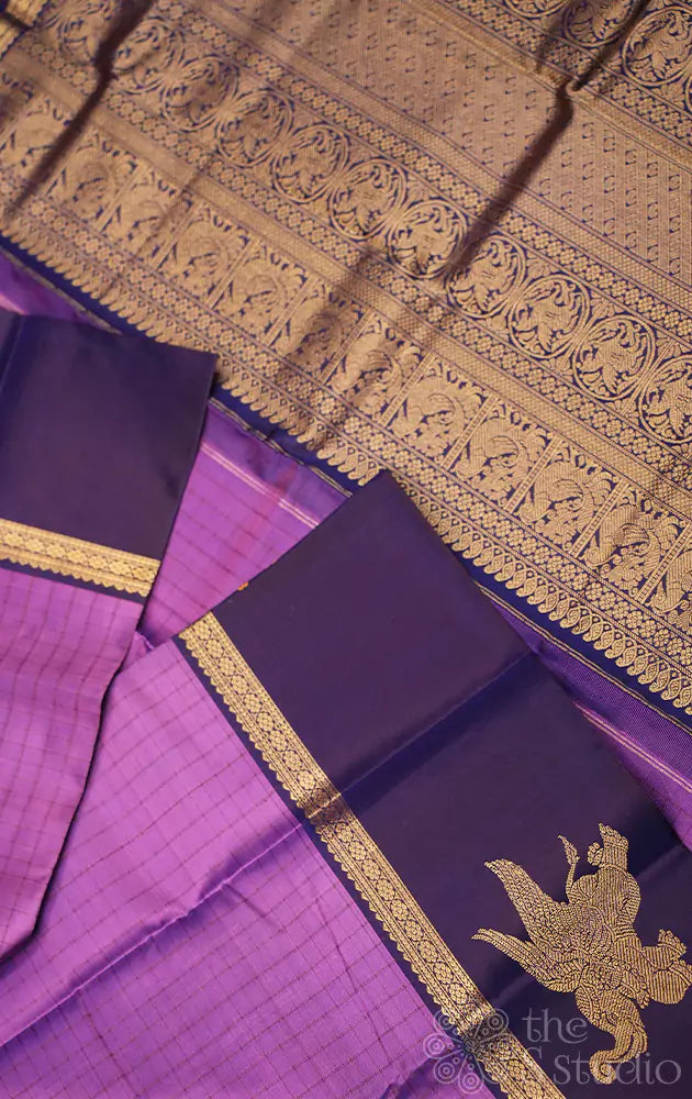 Light violet kanchi silk saree with elephant motifs border