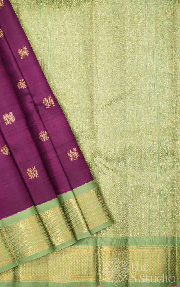 Deep purple kanjivaram saree with elachi green korvai border
