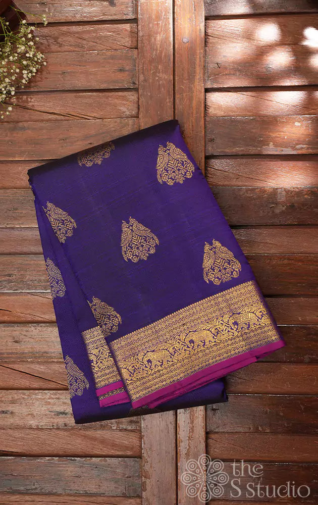 Bright blue kanchipuram silk saree with woven jodi kili zari motifs